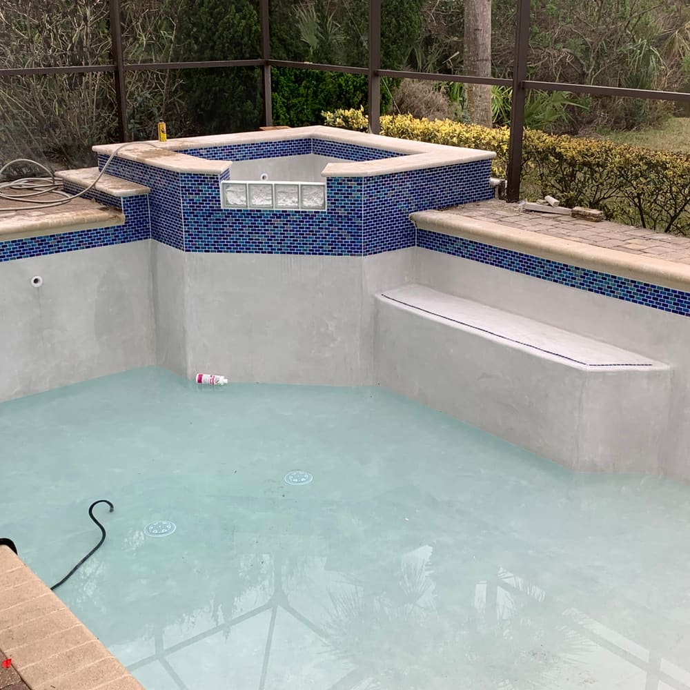 Drained community pool ready for resurfacing